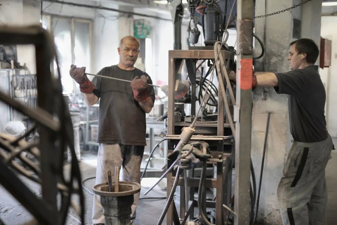 Technicians working on industrial equipment